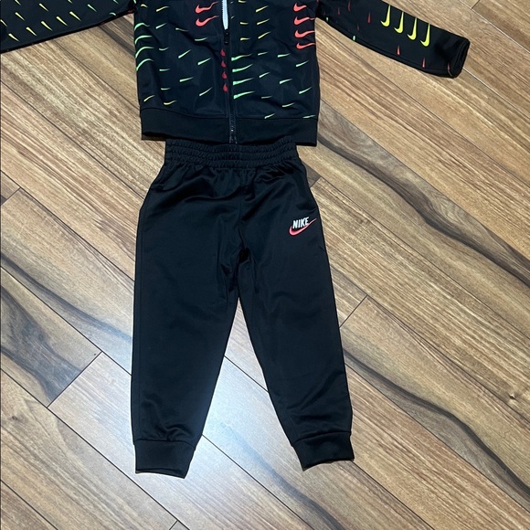 Nike Black Tracksuit with Red, Green and Yellow Accents. - Picture 9 of 9